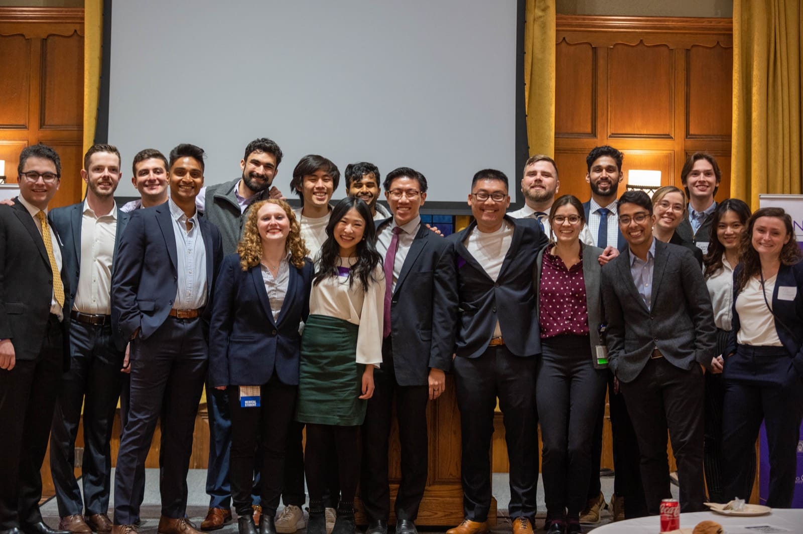 A large Sling Health cohort photographed together after Demo Day.