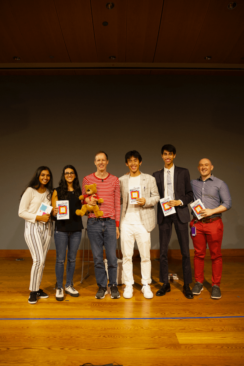 Jim McKelvey on stage with Sling Health students at the 2021 Speaker Series.